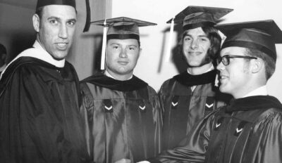 Sr. Stuart Steiner with graduating students