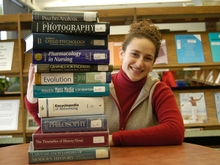 Student with pile of books