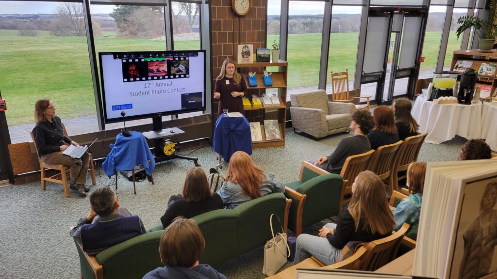 Librarian and photo contest organizer Liz Simmons speaking to attendees