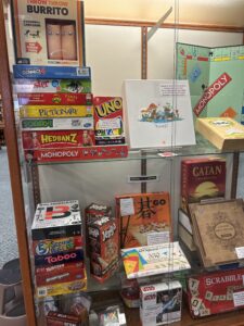 Board games including Uno, Pictionary, Throw throw burrito, Catan, Taboo, Jenga, Tokaido, and more.