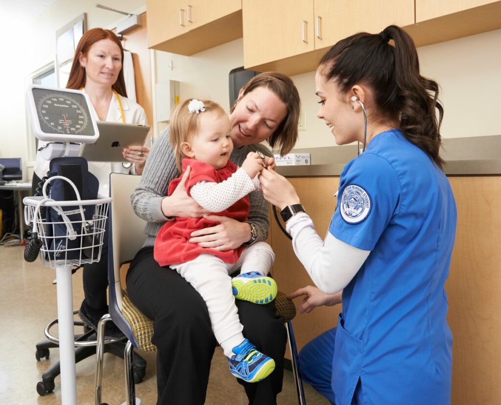 Nursing student with patient