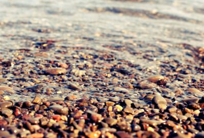 Close-up photo of pebbles on a beach