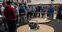 Students from local high schools compete in a robot challenge