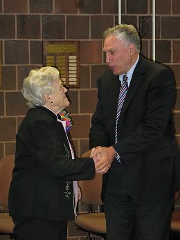 Betty Lane and Stuart Steiner shaking hands